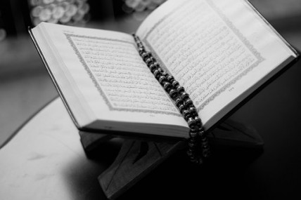 A Qur’an on his table