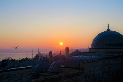 The dome of the mosque and sunset